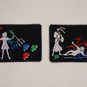 May include: Two black embroidered patches. One features a white figure with a trident and colorful accents. The other patch has a similar design with the text "Hakurai Exorcist Group".