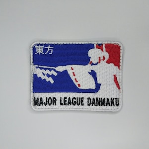 May include: Embroidered patch featuring a stylized baseball player silhouette in white against a red background. The patch has a blue field with Japanese text and the words "MAJOR LEAGUE DANMAKU" in white.