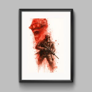 Könnte beinhalten: Gerahmter Aquarelldruck mit einer Figur mit Gasmaske und Militäruniform, die ein Gewehr hält. Im Hintergrund eine rote, monströse Figur. Das Kunstwerk ist in Rot- und Brauntönen gehalten.