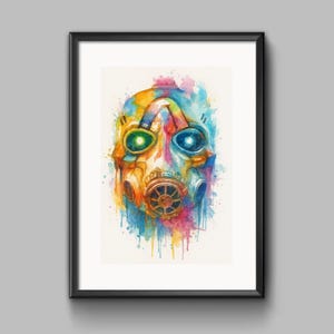 Könnte beinhalten: Ein gerahmter Aquarelldruck einer Gasmaske in leuchtenden Farben. Die Maske hat grüne und blaue Linsen, ein goldfarbenes Atemschutzgerät und einen farbenfrohen Spritzerhintergrund. Das Kunstwerk ist in einem schwarzen Rahmen gerahmt.