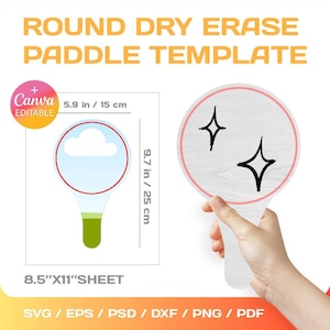 May include: A printable template for a round dry erase paddle, measuring 9.7 inches in diameter. The paddle features a white background with a pink outline and two black star-shaped drawings. The template is designed to be used with Canva and is available in SVG, EPS, PSD, DXF, PNG, and PDF formats.
