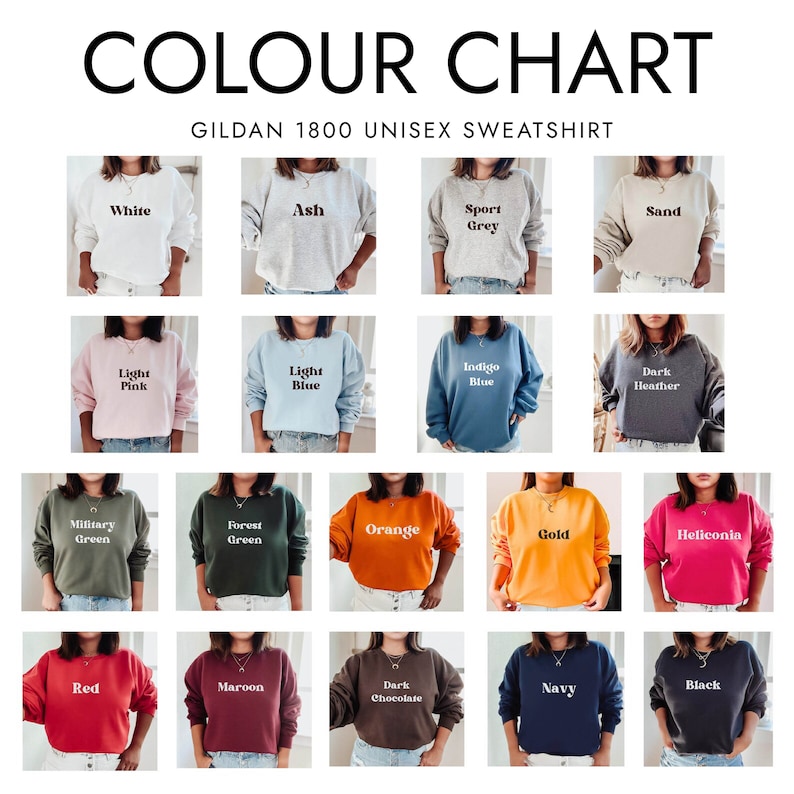 May include: Color chart showing 18 different colors of Gildan 1800 unisex sweatshirts. The colors include white, ash, sport grey, sand, light pink, light blue, indigo blue, dark heather, military green, forest green, orange, red, maroon, gold, heliconia, dark chocolate, navy, and black.