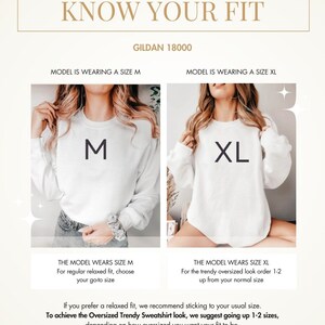 May include: Two models wearing a white sweatshirt, one wearing a size M and the other wearing a size XL. The text "KNOW YOUR FIT" and "GILDAN 18000" is at the top of the image. The text "The Model 5'10" 178 CM" is at the bottom of the image.