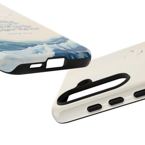 May include: Two white phone cases with black trim. One case has a blue and white wave design and the other case has a simple white design. Both cases have cutouts for the camera and buttons.