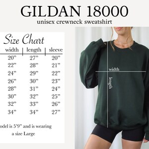 May include: Size chart for a Gildan 18000 unisex crewneck sweatshirt. The chart shows measurements in inches for sizes S through 5XL, including width, length, and sleeve length. A model is wearing a size Large.