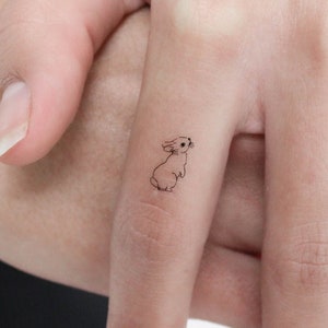 Piccolo tatuaggio temporaneo di coniglio in piedi (set di 3)