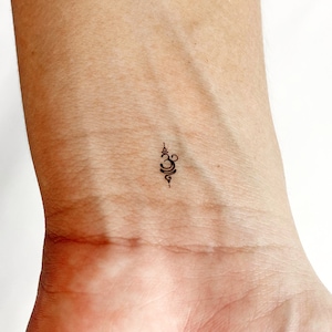 Tatuaggio temporaneo con simbolo sanscrito "Tiny Breathe" (set da 3)