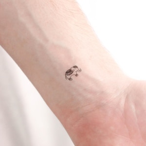 Piccolo tatuaggio temporaneo elefante ornamentale (set di 3)