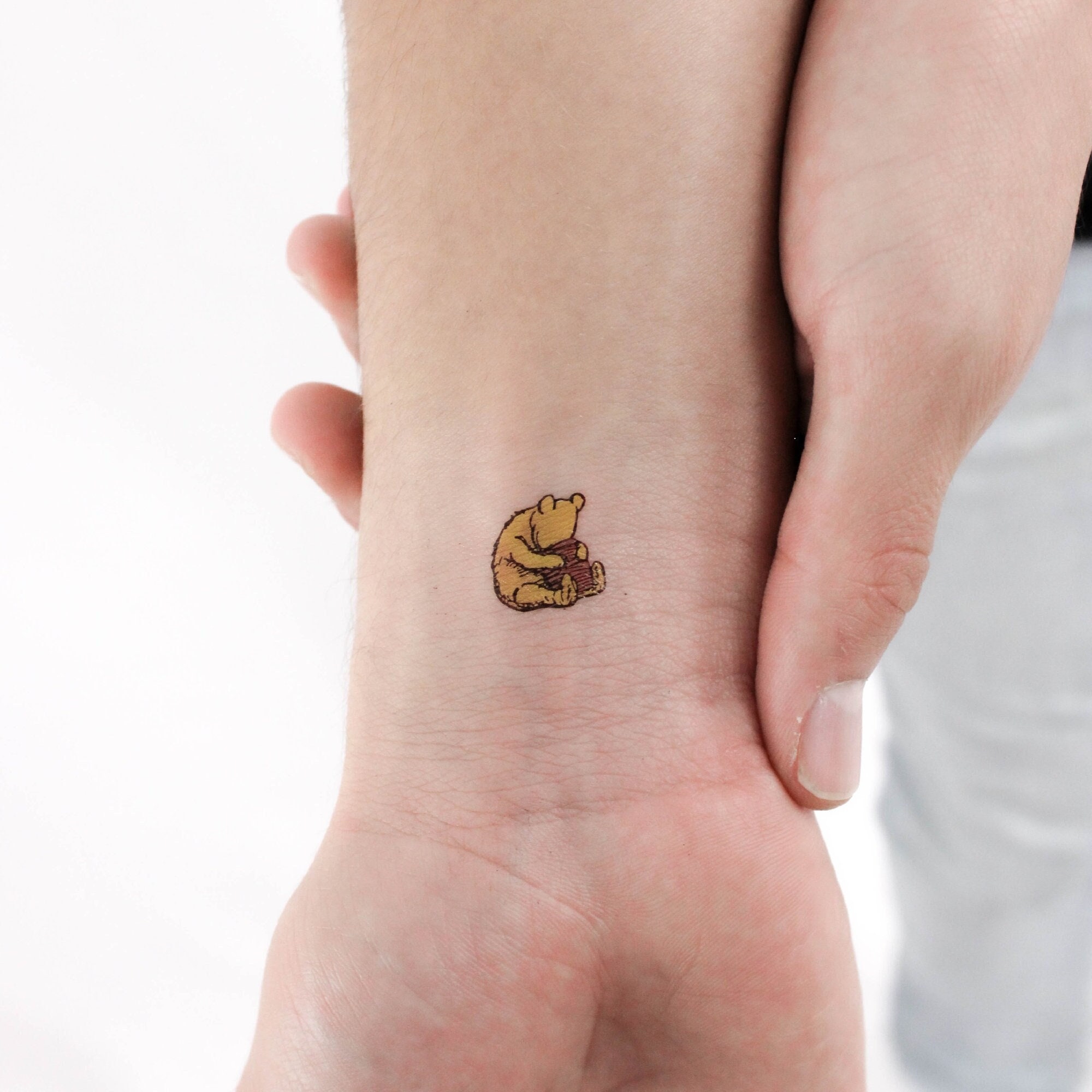 Get a Cute Winnie the Pooh Tattoo