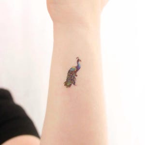 Piccolo tatuaggio temporaneo pavone (set di 3)