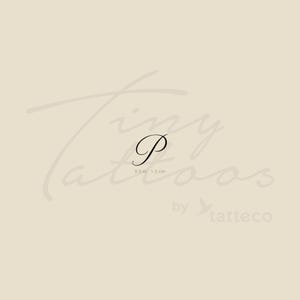 May include: A black cursive letter "P" temporary tattoo, 1.2 cm in height, on a beige background. The words "Tiny Tattoos" are written in a light brown script, with "by tatteco" below the tattoo.
