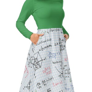 May include: A green long-sleeved shirt with a white skirt featuring a pattern of handwritten mathematical equations on a grid paper background.
