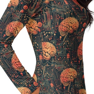 May include: A long-sleeved dress with a dark blue background and a pattern of orange and yellow brains and circuit boards.