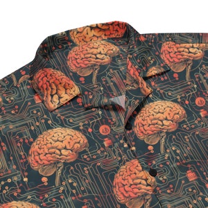 May include: A dark blue button-up shirt with a pattern of orange and yellow brains on a circuit board background.