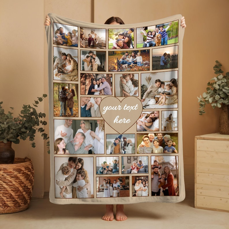 May include: A beige rectangular fleece blanket featuring a photo collage of various family moments arranged in rectangular frames, with a central heart-shaped graphic containing the white text your text here.