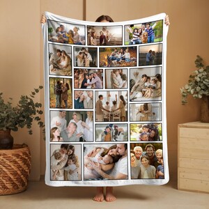 May include: A white fleece blanket featuring a collage of numerous color photographs showcasing various family moments, including outdoor activities, indoor gatherings, and portraits of groups and individuals in different settings.