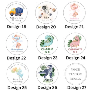 May include: A collection of round stickers with various designs for birthdays. Designs include a construction truck, an astronaut, teddy bears with balloons, and dinosaurs. Text includes names and ages.
