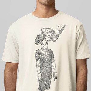 Comfort Colors® ivory unisex T-shirt featuring Prakash’s hand-drawn line-art figure; clean close-cropped on-body photo on a neutral background showing the full front graphic and relaxed heavyweight cotton fit.