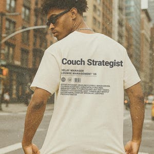 Comfort Colors® Trendy Couch Strategist Unisex T-Shirt Funny Typography Tee, Gift for Lazy Friends, Witty Shirt, Sarcastic Work Humor
