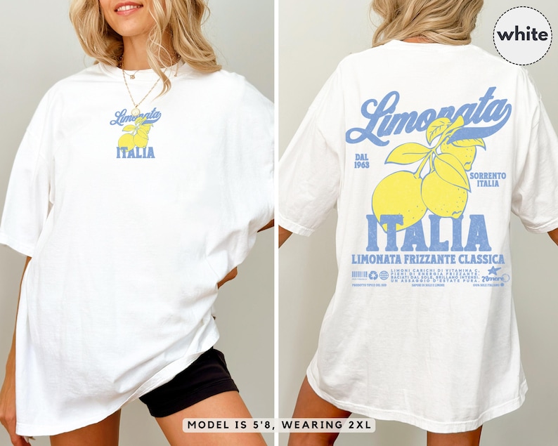 White Comfort Colors® t-shirt with vintage Italian lemonade back print and small citrus chest logo. Oversized fit styled by a 5’8” model wearing size 2XL. Retro foodie shirt for travel and summer looks.