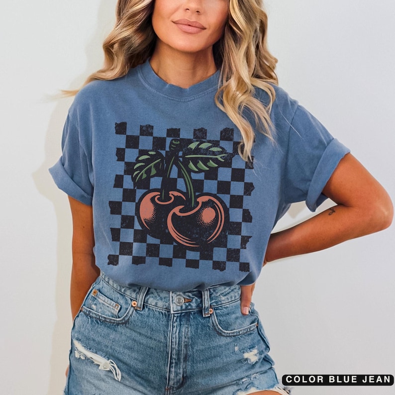 Comfort colors blue jean checkered tshirt for women with a retro bold cherry print. Distressed style for a worn in look.