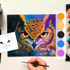 May include: A colourful owl painting in shades of orange, purple, and blue. A colour palette and a sketch of the owl are next to the painting. Paintbrushes and a small potted plant are also visible.