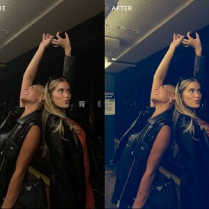 May include: Two women wearing black leather jackets pose with their arms raised in the air. One woman is wearing a red sleeveless top and the other is wearing a black sleeveless top. They are standing in front of a subway station with a sign that reads "Spring Street".