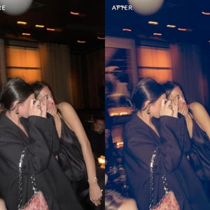 May include: Two people in a dimly lit room, both wearing black jackets and covering their mouths with their hands. The person in the foreground is wearing a black jacket with a floral patterned bag.
