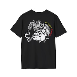 May include: Black t-shirt with a bulldog graphic holding a cigar and binoculars, with the text "crayon eaters" in yellow and red. The graphic also includes the letters "USMC".