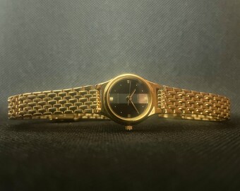 Classic Gold Citizen Quartz Glow in the Dark Calendar Watch Classic Gold Citizen Quartz Glow in the Dark Calendar Watch  main image 2