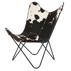 Handgjord läderfåtölj med fjärilsmotiv: Retro lounge-accent för uteplats och vardagsrum