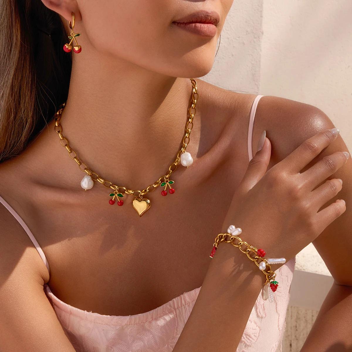 Stainless steel charm necklace: Cherries, heart and pearl elements