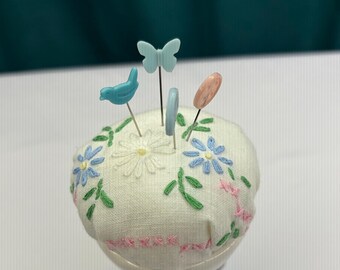 Vintage ceramic egg cup with bunny slippers pin cushion