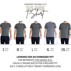 May include: Size guide for Comfort Colors 1717 t-shirts. The image shows a model wearing different sizes of a gray t-shirt, from S to 2XL. Measurements are provided in inches for width and height. Text advises sizing up for an oversized fit.