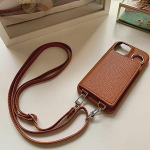 Étui de téléphone en cuir pour iPhone bandoulière avec dragonne iPhone 15 14 13 12 Pro Max Plus portefeuille avec porte-cartes