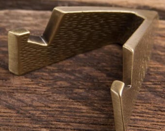 Expositor de monedas metálico para un solo desafío