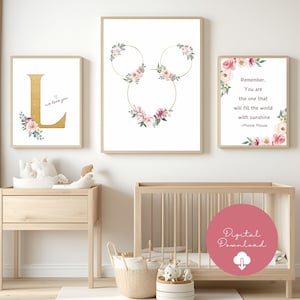 May include: Three framed art prints with floral and gold accents. One features a gold letter "L" with flowers and the text "we love you." Another displays a Mickey Mouse head shape with floral arrangements. The third print has a quote from Minnie Mouse.