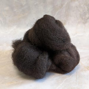 PA Romney Sheep Combed Top - hand combed and pulled. Dark Brown/black - For spinning - by the ounce