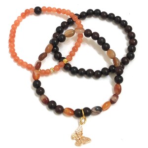 3 bracelets, Natural Carnelian and Natural Mashan Jade gemstones, Rosewood beads, gold spacer beads w/butterfly charm, butterfly bracelet