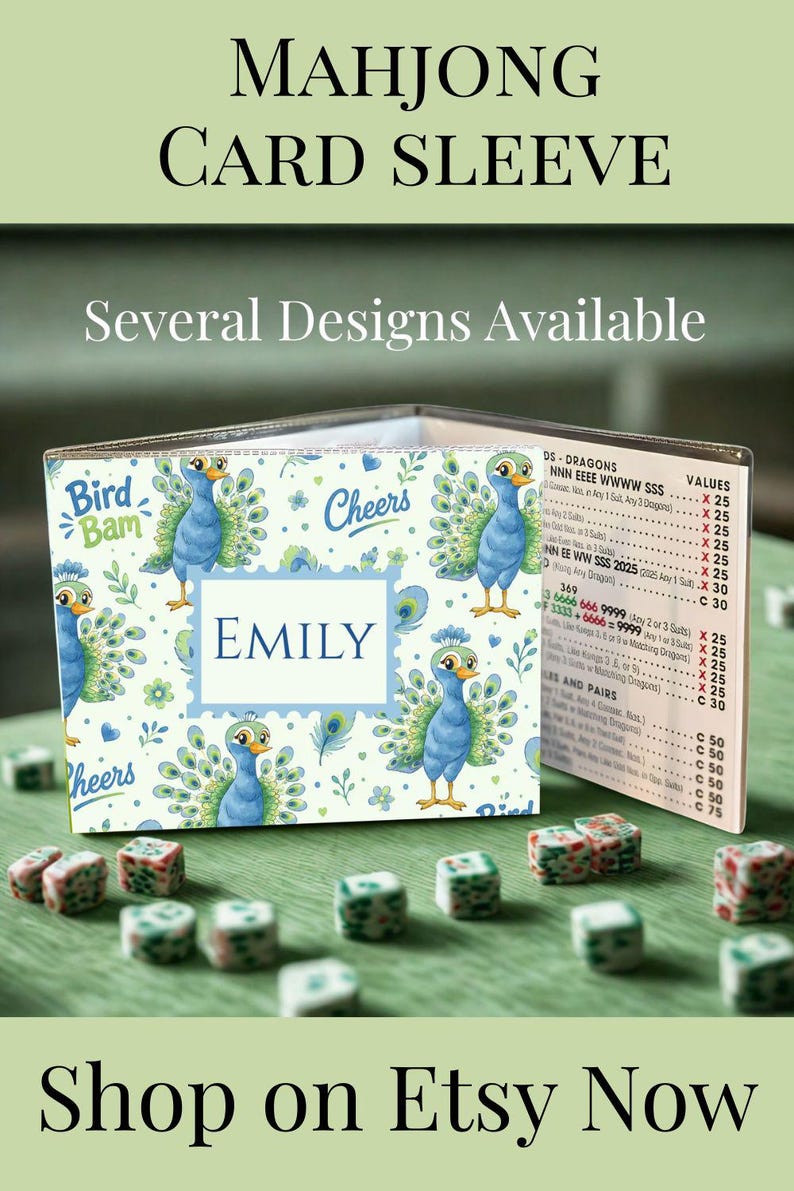 May include: A clear plastic Mahjong card sleeve featuring a repeating pattern of blue peacocks, green floral accents, and the text Bird Bam, Cheers, and Emily. The sleeve displays a printed Mahjong score card with columns for hands, dragons, and values.