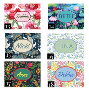 May include: Six rectangular name plaques labeled 13 through 18. Designs include pink peonies, a lotus pond, cranes on dark blue, blue hydrangeas, a dark floral peacock pattern, and colorful flowers. Each plaque features a central name label.