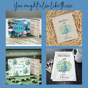 May include: A collage featuring personalised items: a card with a lotus design labelled BETH, a drawstring pouch with a peacock graphic labelled Bird Bam Cheers, a card with a peacock pattern labelled EMILY, and a waffle-weave towel with a peacock graphic.