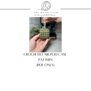 May include: A crocheted green airpod case with a loop for hanging. The case is being held by a hand in front of a white tiled background. The text "CROCHETED AIR POD CASE PATTERN (PDF ONLY)" is below the image.