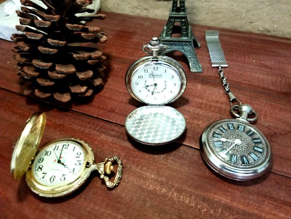 3 Pocket Watches: Futura, Westclox, The American Historic Society.