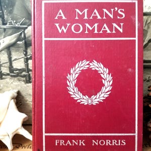 A Man’s Woman von Frank Norris Hardcover Buch Grosset & Dunlap 1900