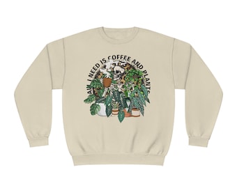 Sweater met koffie en planten