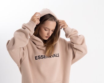 Beige Kangaroo Pocket Oversize Sweatshirt, Essentials Print Unisex Hoodie, Streetwear Hoodie Cotton Comfort, Versatile Streetwear Hoodie