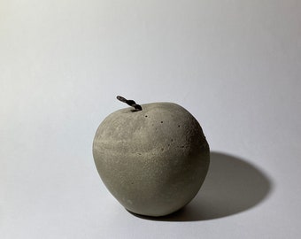 Concrete figure apple statue