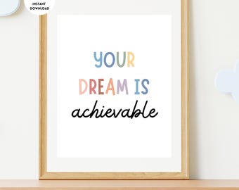 May include: A framed print with the text "YOUR DREAM IS achievable" in colorful letters on a white background.
