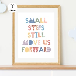 May include: A colourful printable wall art print with the text "Small steps still move us forward".